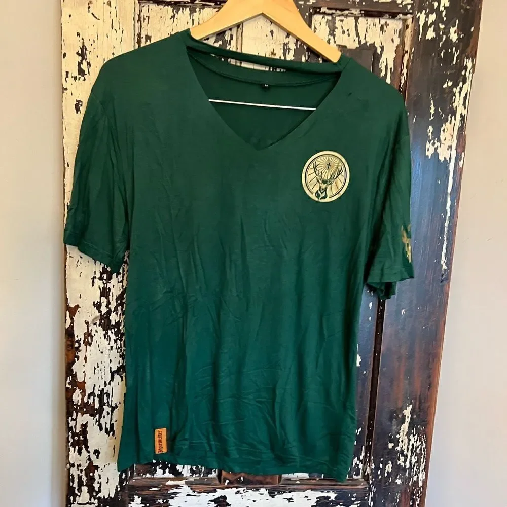 Women’s distressed cut out super soft Jäegermeister dri-fit T-shirt. Size Med.